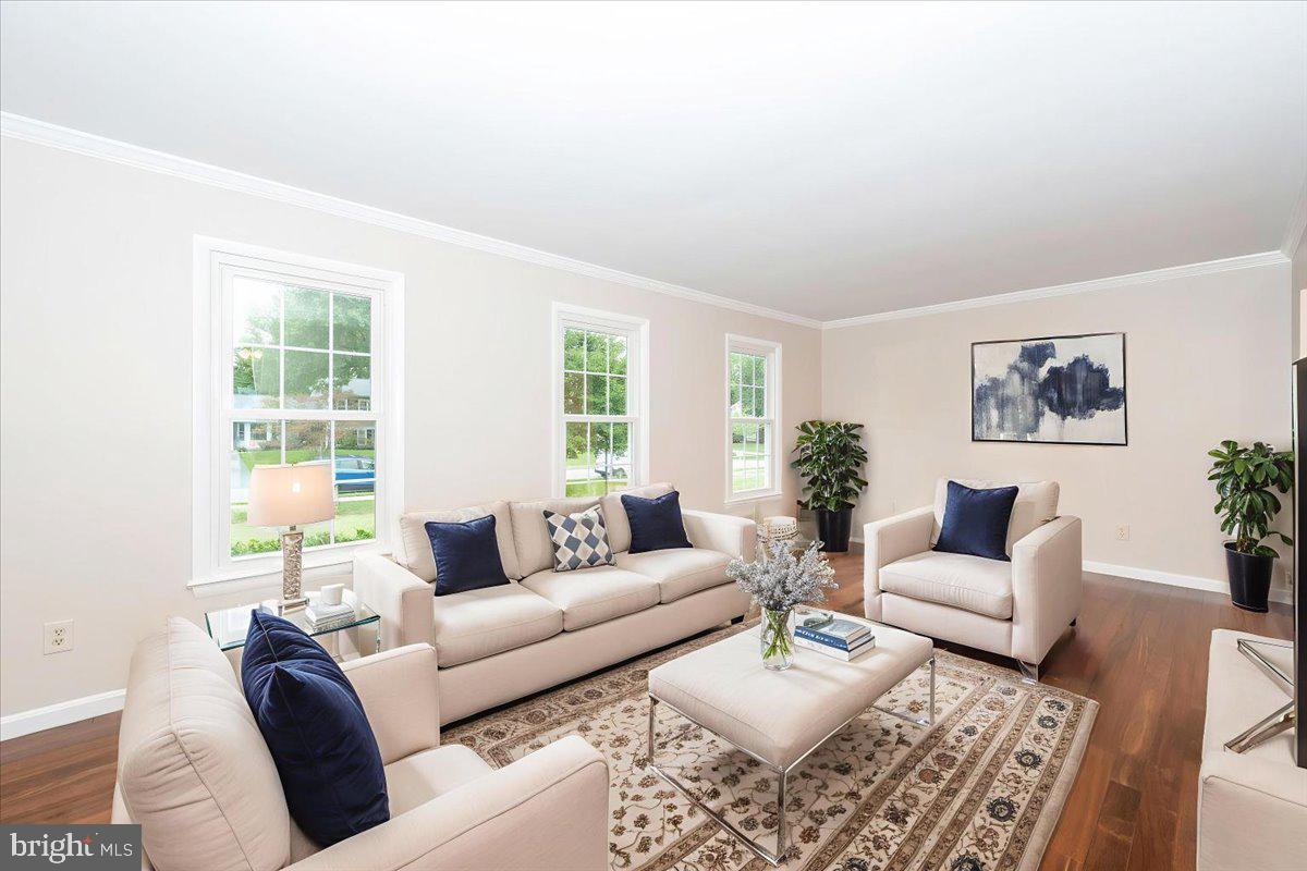 19924 Westerly Avenue Poolesville, MD 20837 - Photo 7 of 80 a living room with furniture and a large window