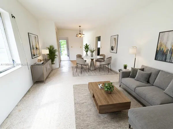 a living room with furniture and a couch