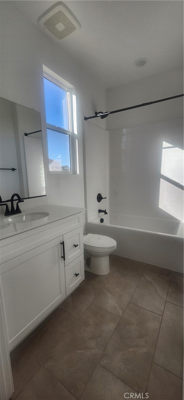 17448 Marion Mountain Hesperia, CA 92345 - Photo 6 of 12 a bathroom with a sink a toilet and bathtub