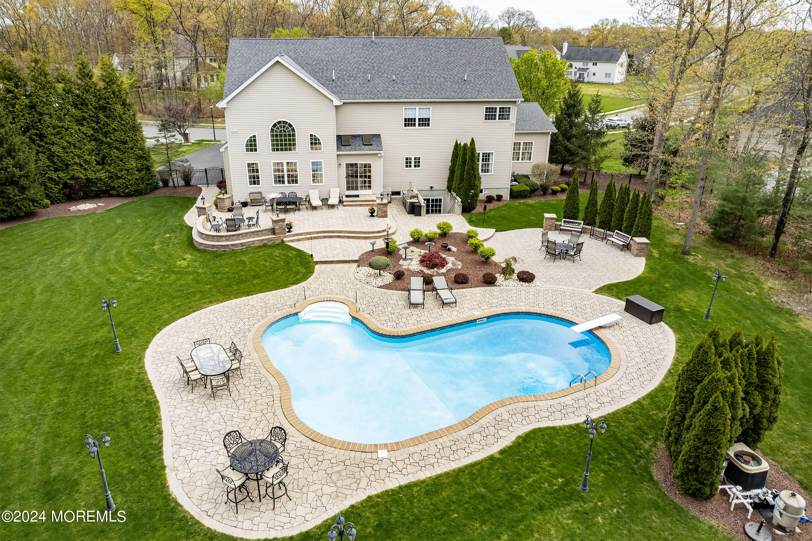 15 Summers Drive Jackson, NJ 08527 - Photo 1 of 83 a view of a house with backyard sitting area and a garden