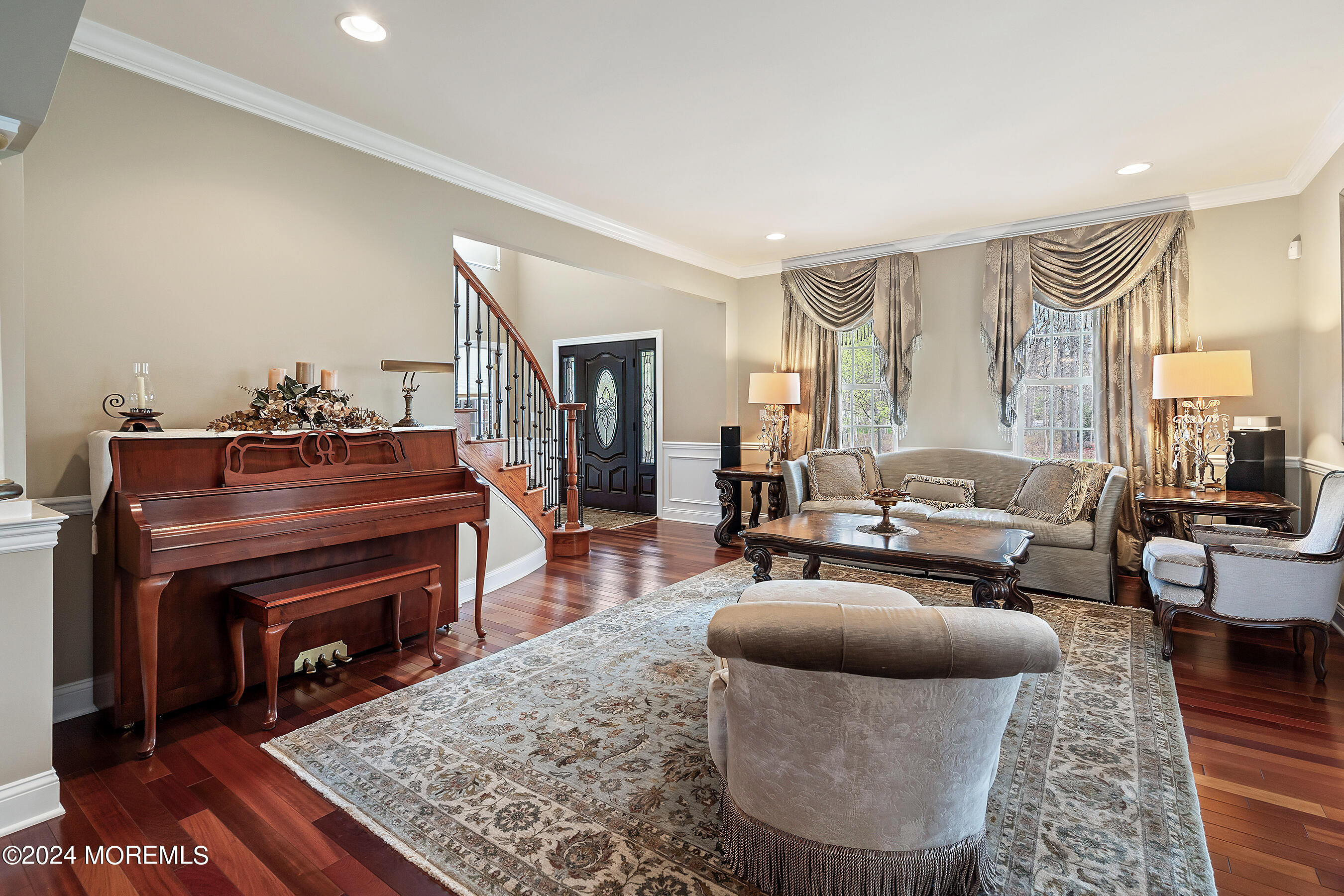 15 Summers Drive Jackson, NJ 08527 - Photo 12 of 83 a living room with furniture a fireplace and a rug