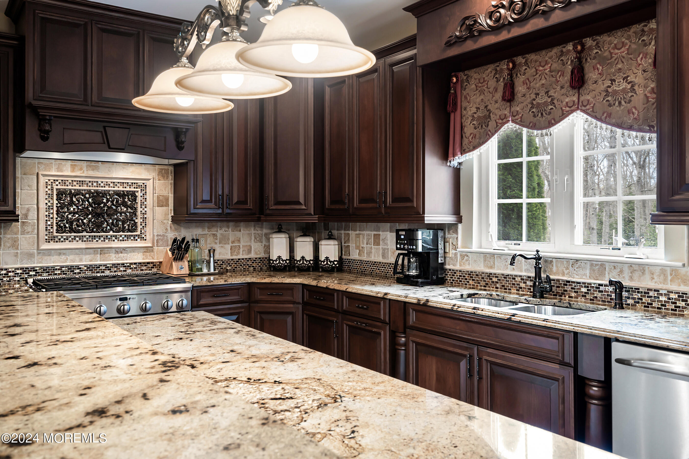 15 Summers Drive Jackson, NJ 08527 - Photo 21 of 83 a kitchen with stainless steel appliances kitchen island granite countertop a sink and a stove
