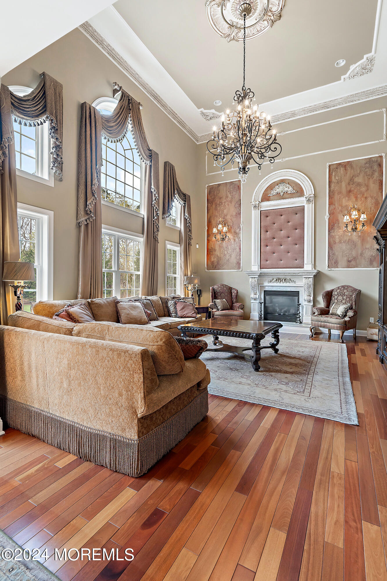 15 Summers Drive Jackson, NJ 08527 - Photo 30 of 83 a living room with furniture and a chandelier