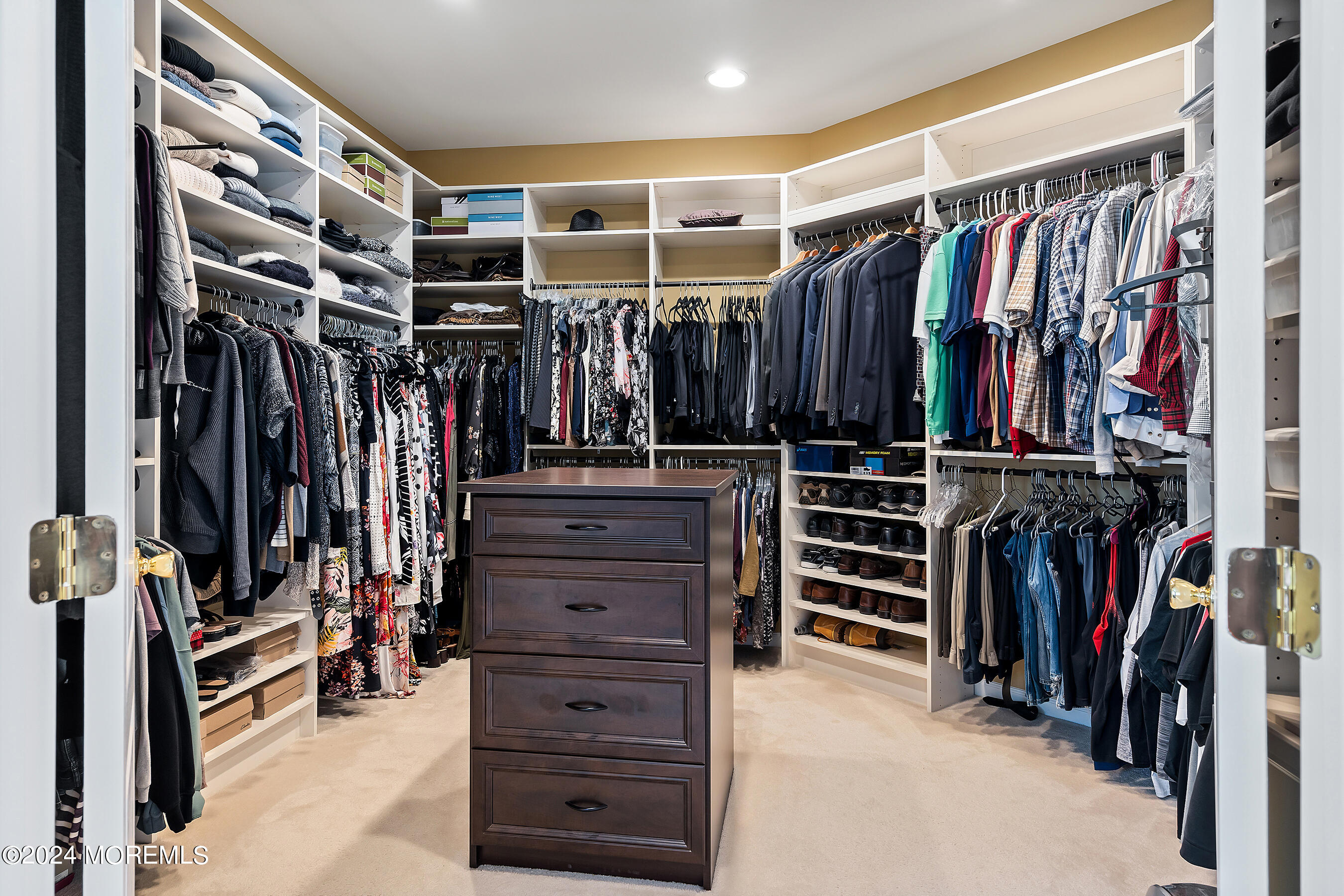 15 Summers Drive Jackson, NJ 08527 - Photo 47 of 83 a view of walk in closet with clothes and shoes