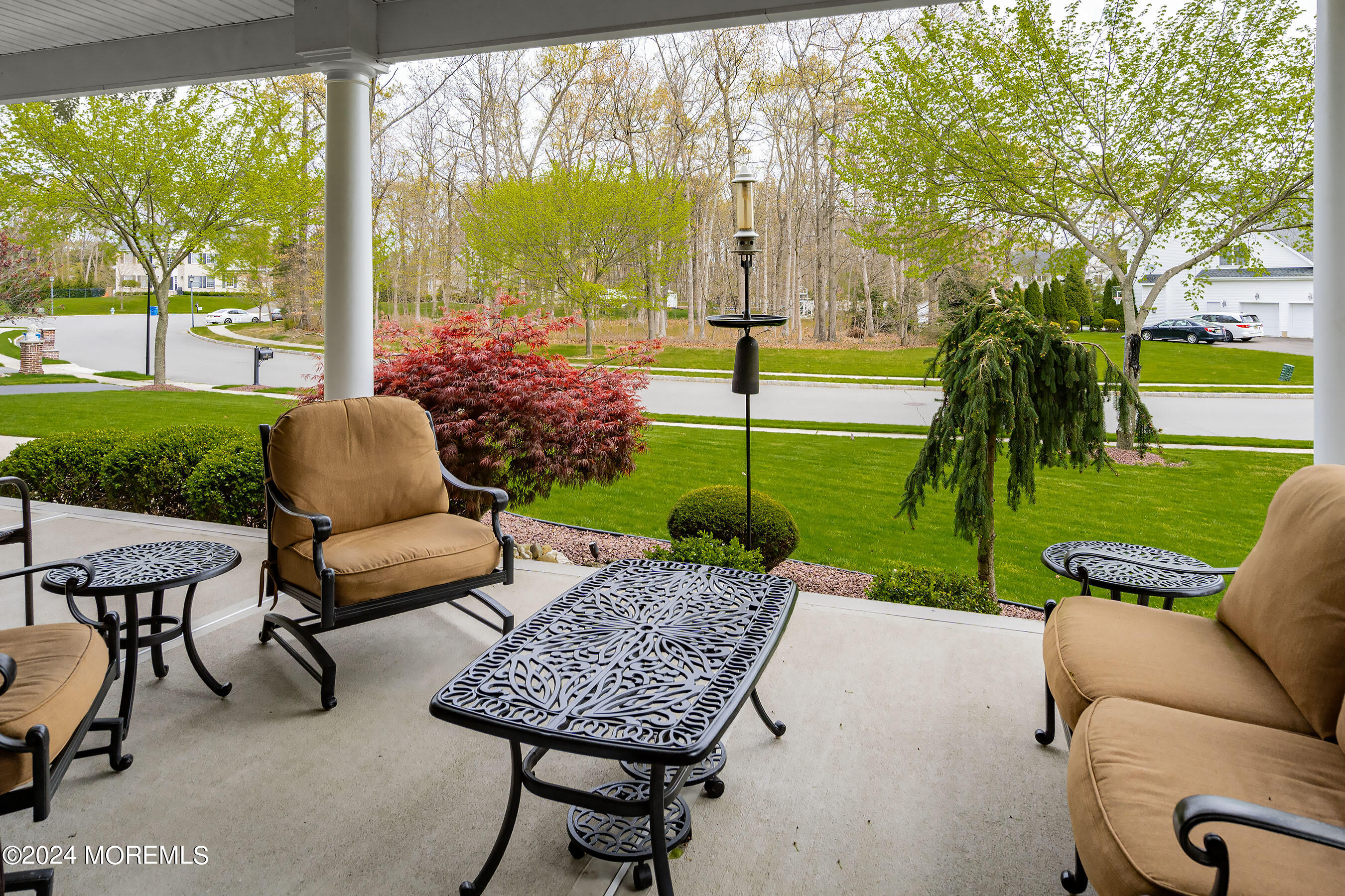 15 Summers Drive Jackson, NJ 08527 - Photo 5 of 83 a view of a table and chairs in patio with a yard
