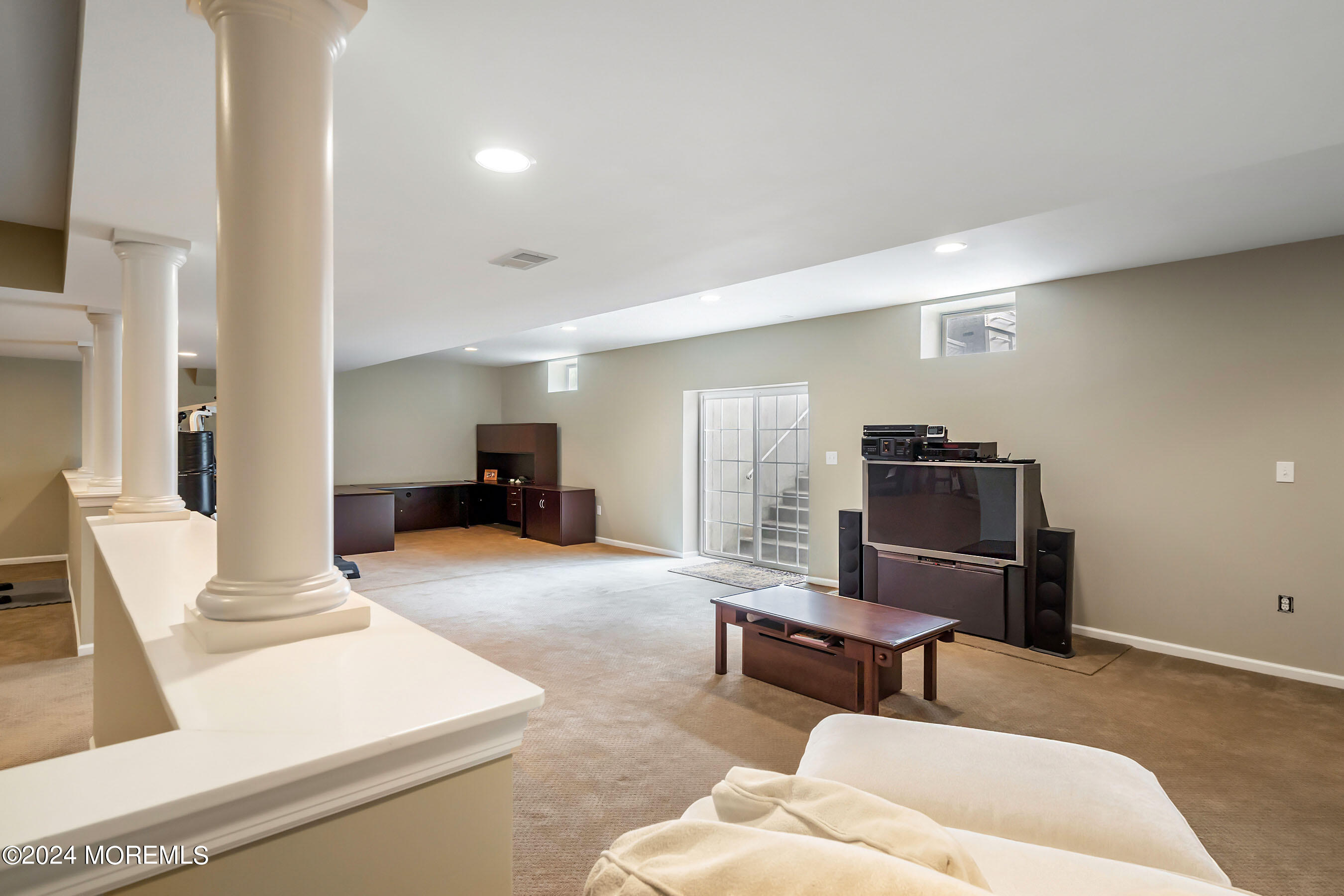 15 Summers Drive Jackson, NJ 08527 - Photo 60 of 83 a living room with furniture and a flat screen tv