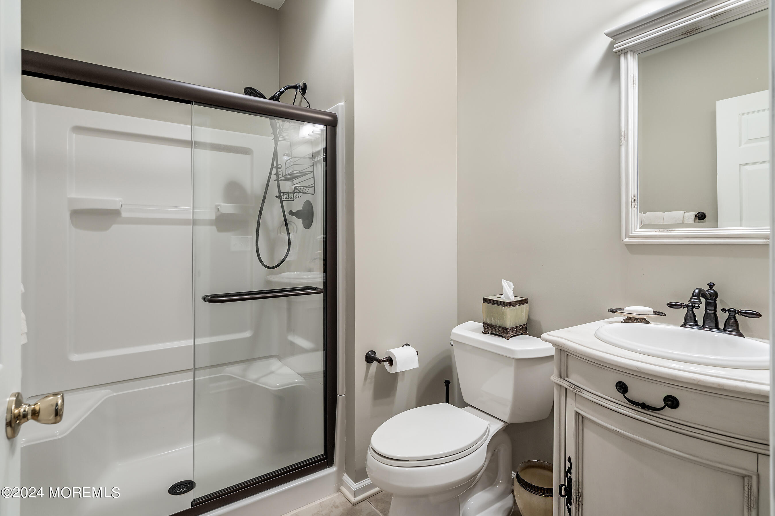 15 Summers Drive Jackson, NJ 08527 - Photo 62 of 83 a white toilet sitting next to a bathroom sink