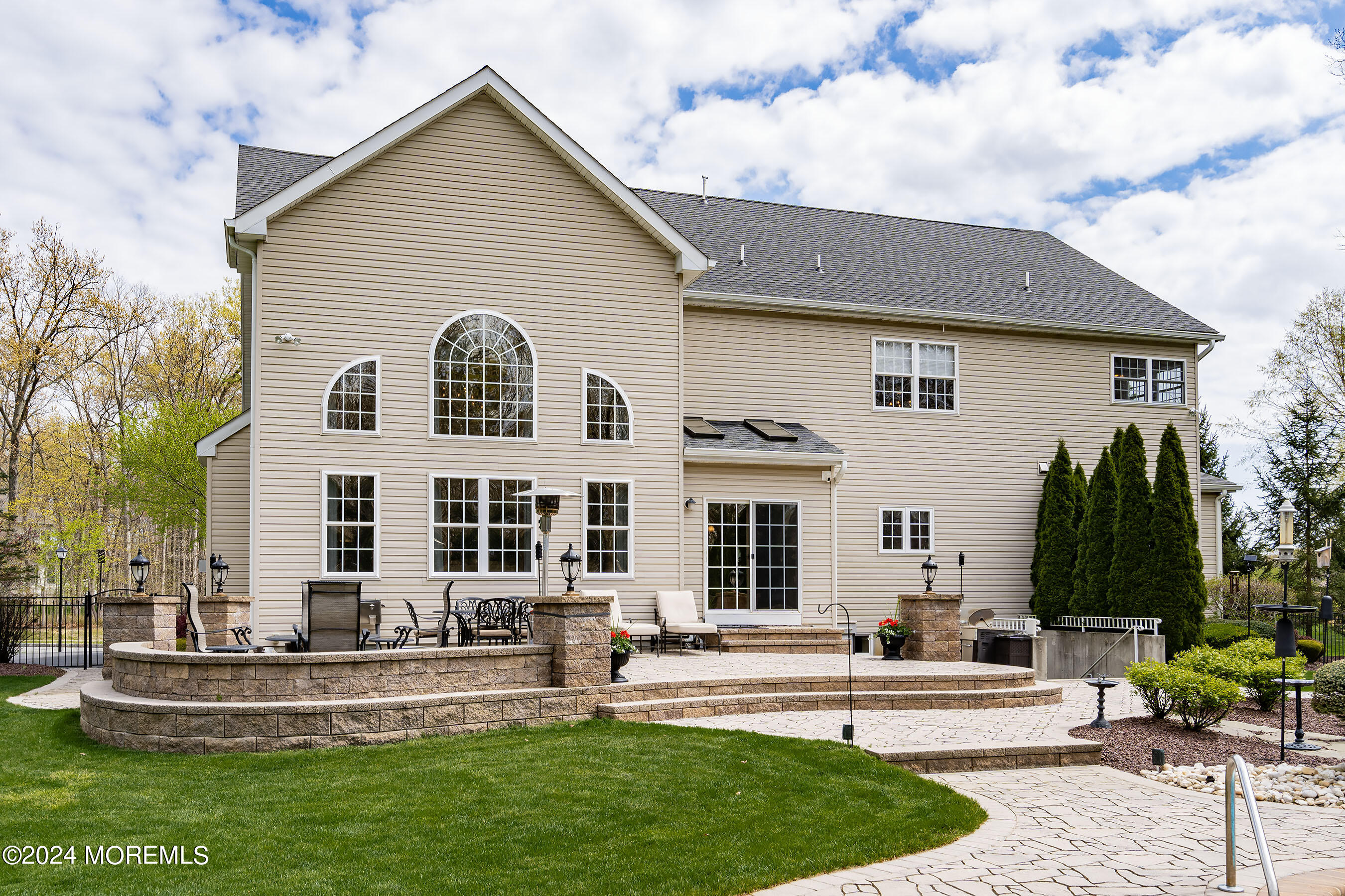 15 Summers Drive Jackson, NJ 08527 - Photo 73 of 83 a front view of a house with a yard table and chairs