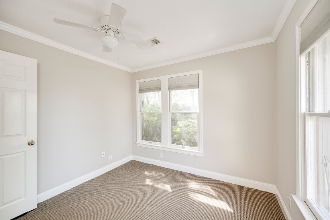 5602 Roosevelt Avenue Austin, TX 78756 - Photo 15 of 22 a view of an empty room with a window