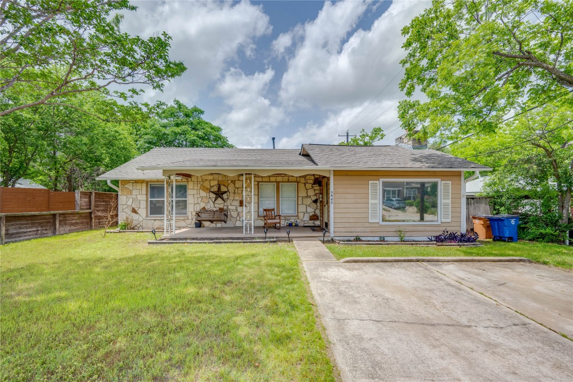 5602 Roosevelt Avenue Austin, TX 78756 - Photo 2 of 22 a front view of a house with swimming pool and porch with furniture