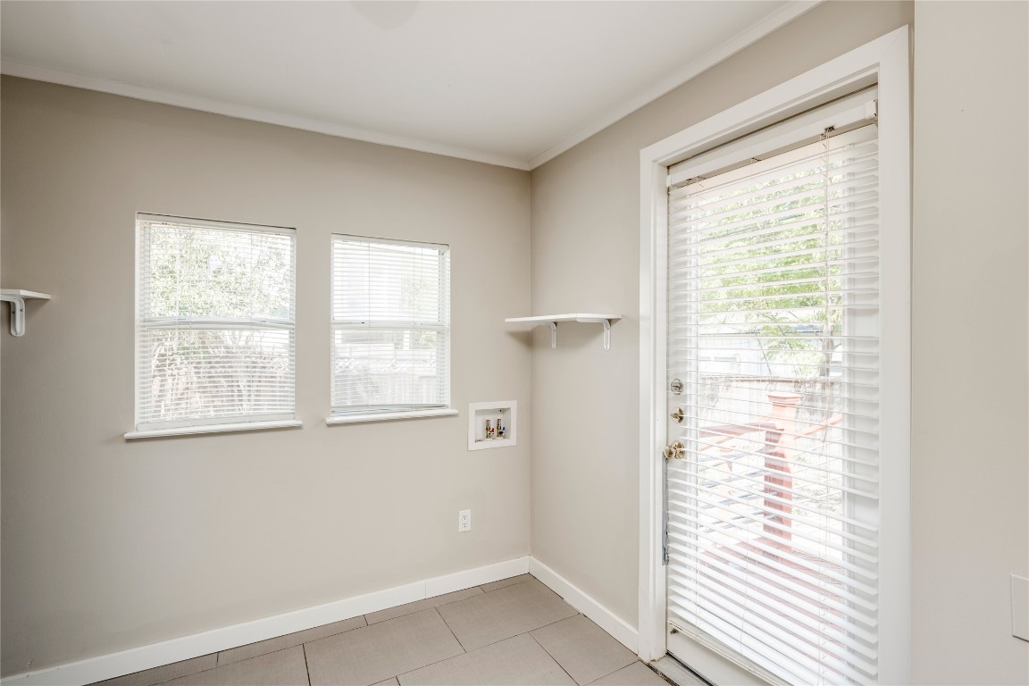 5602 Roosevelt Avenue Austin, TX 78756 - Photo 9 of 22 a view of an empty room with a window