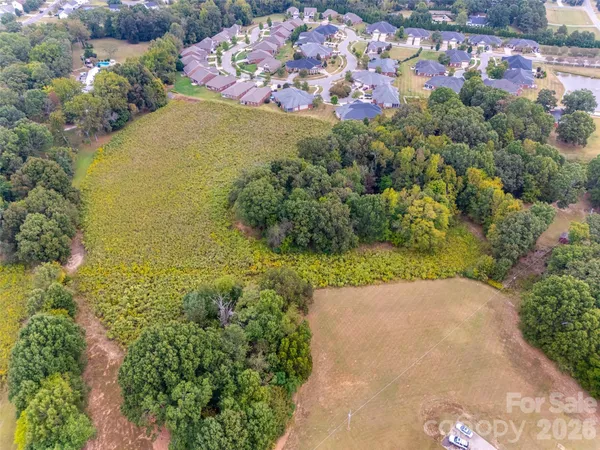 a view of a yard with an ocean