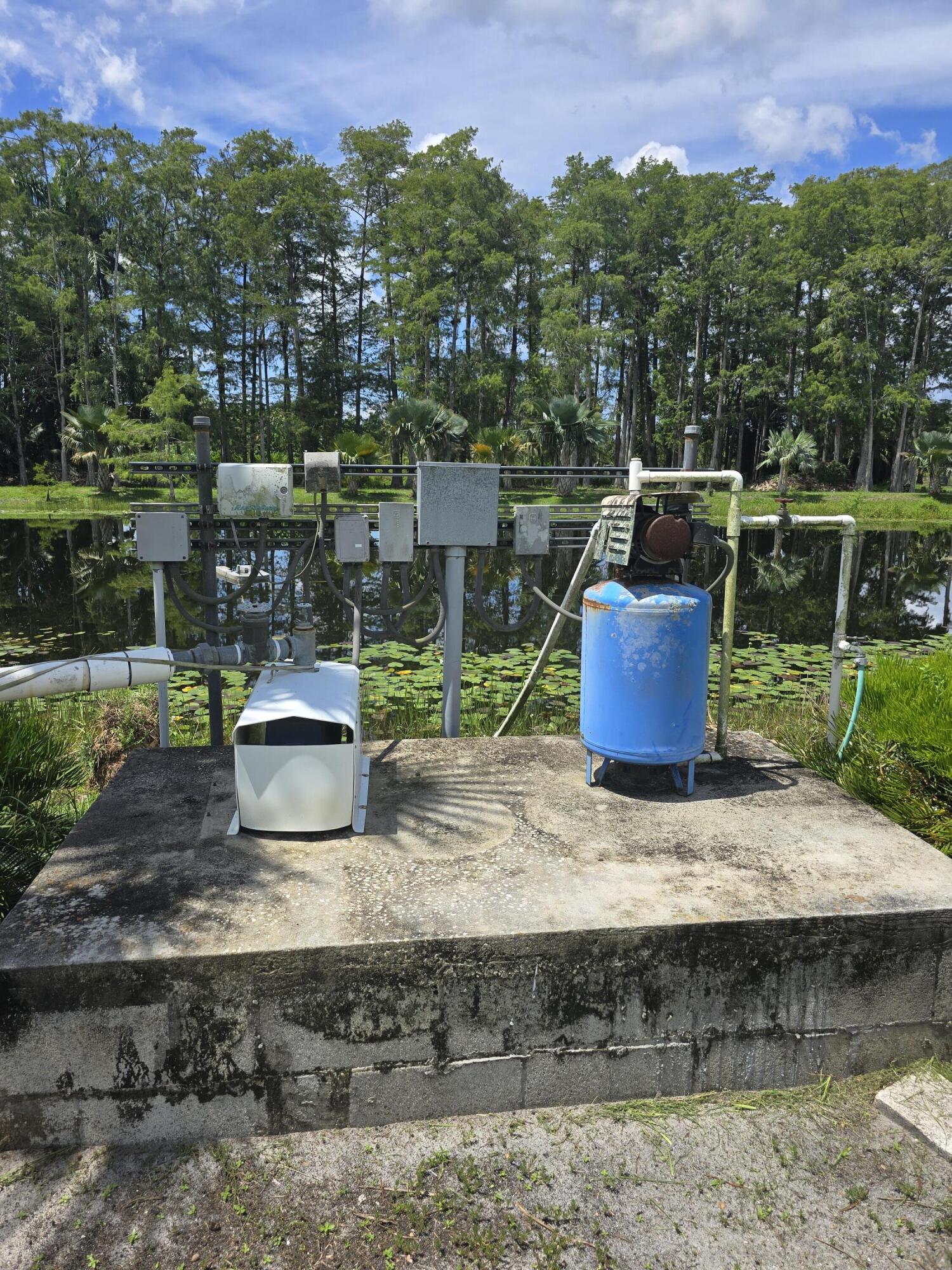 0 B Road Loxahatchee, FL 33470 - Photo 21 of 24 a view of a yard with a table and chair