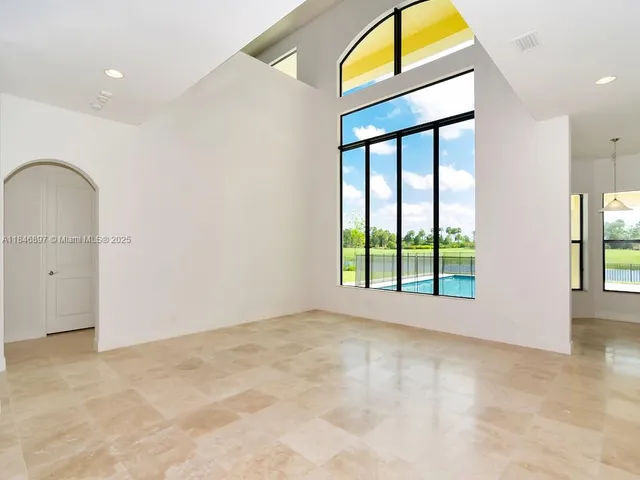 an empty room with windows