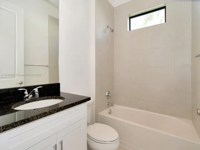 a view of a garden from a balcony