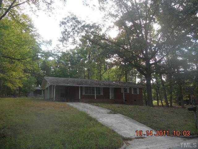501 Dacian Road Raleigh, NC 27610 - Photo 1 of 3 a front view of a house with a garden