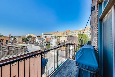 a view of city from a balcony
