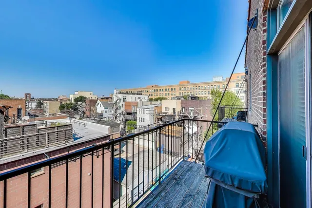 a view of city from a balcony