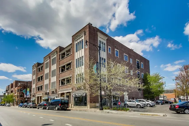 a view of a building and a street