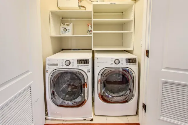 a utility room with dryer and washer