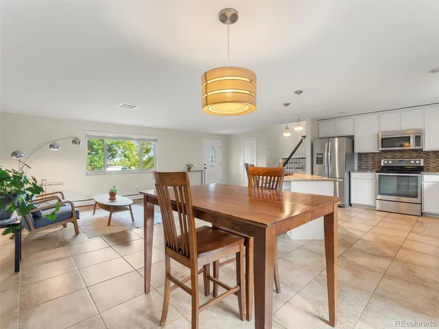 a view of a dining room with furniture