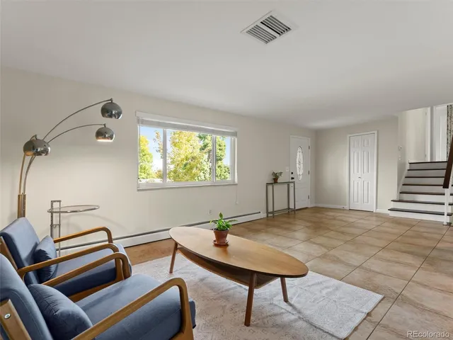 a view of a livingroom with furniture