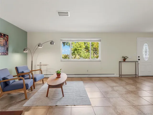 a living room with a couch and a table