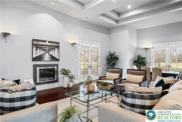 a kitchen with a stove a sink and a window