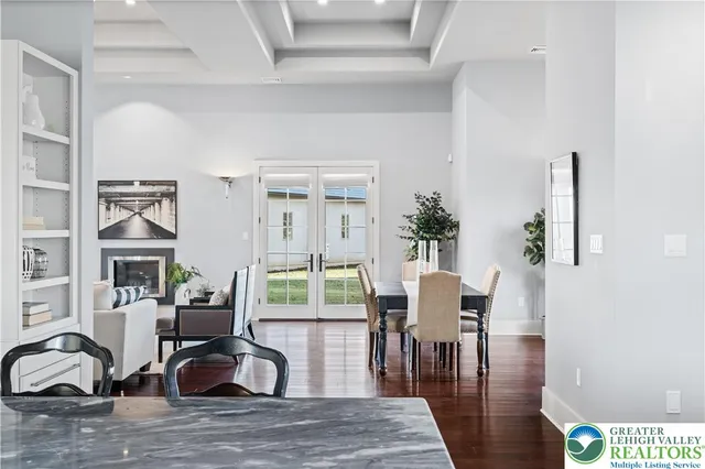 a bedroom with a bed and flat screen tv
