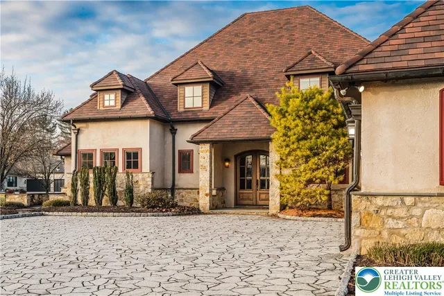 a view of a swimming pool with a yard