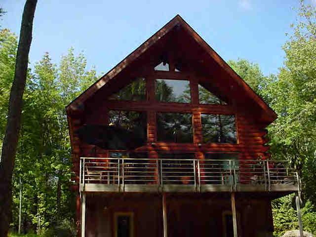 770 Quarry Road Becket, MA 01223 - Photo 2 of 6 a front view of a house with street