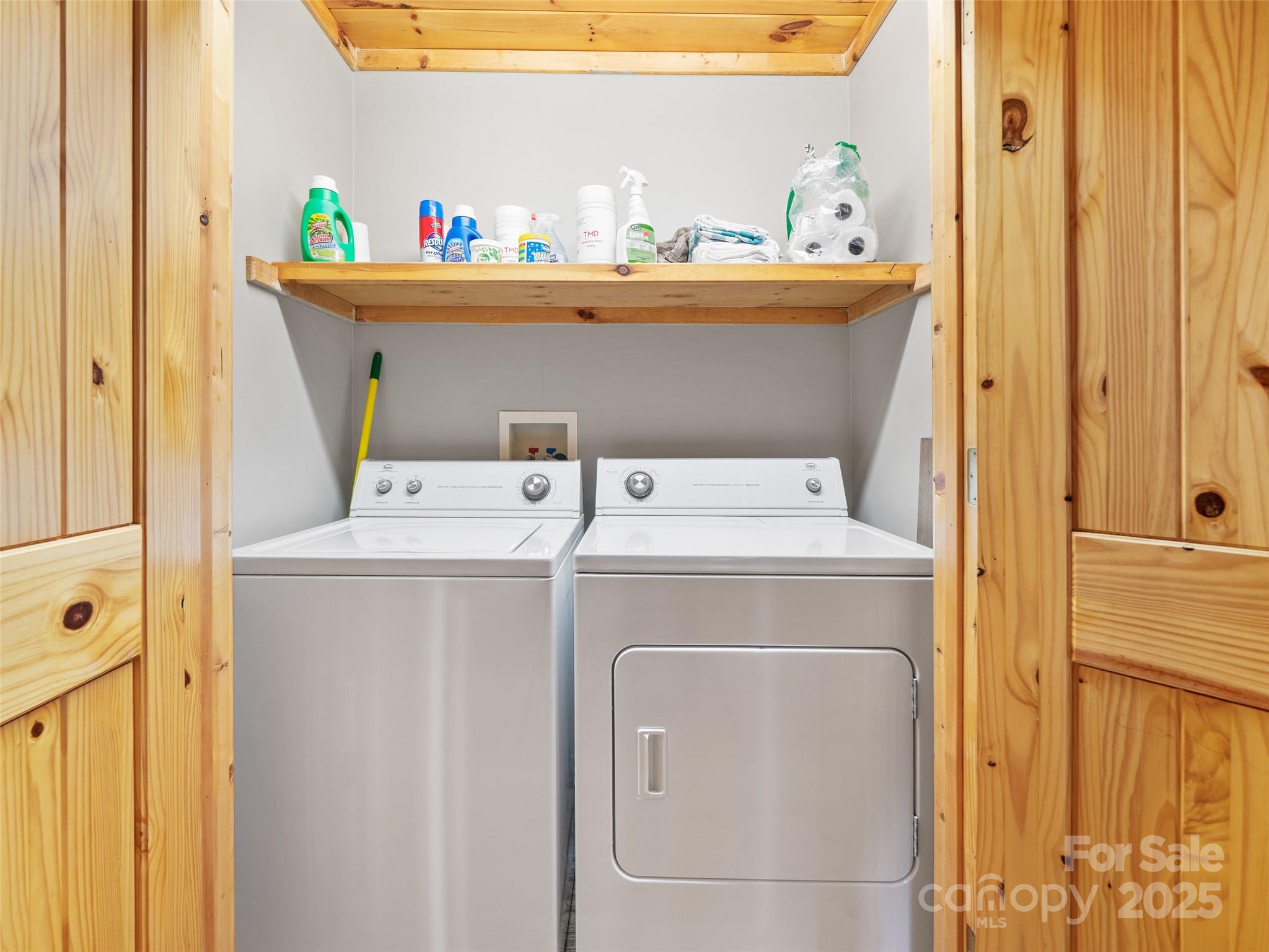 198 Grace Ridge Road Bakersville, NC 28705 - Photo 16 of 27 a utility room with dryer and washer