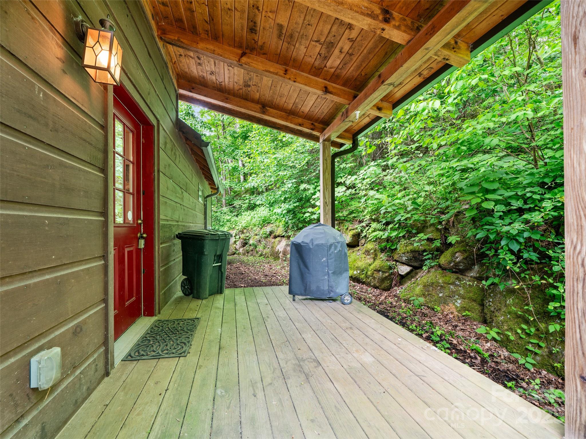198 Grace Ridge Road Bakersville, NC 28705 - Photo 21 of 27 a view of a backyard with garden
