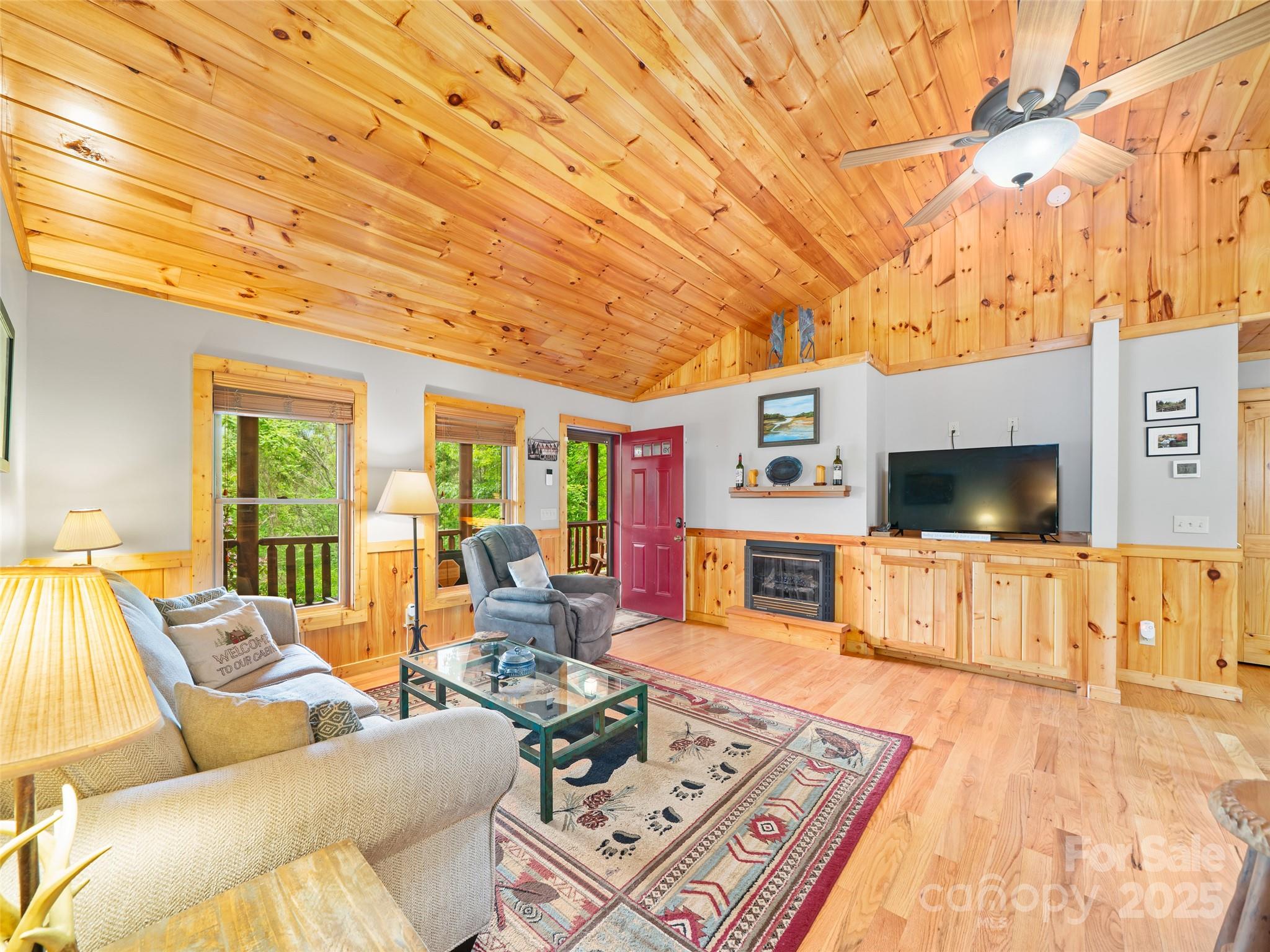 198 Grace Ridge Road Bakersville, NC 28705 - Photo 6 of 27 a living room with furniture and a flat screen tv