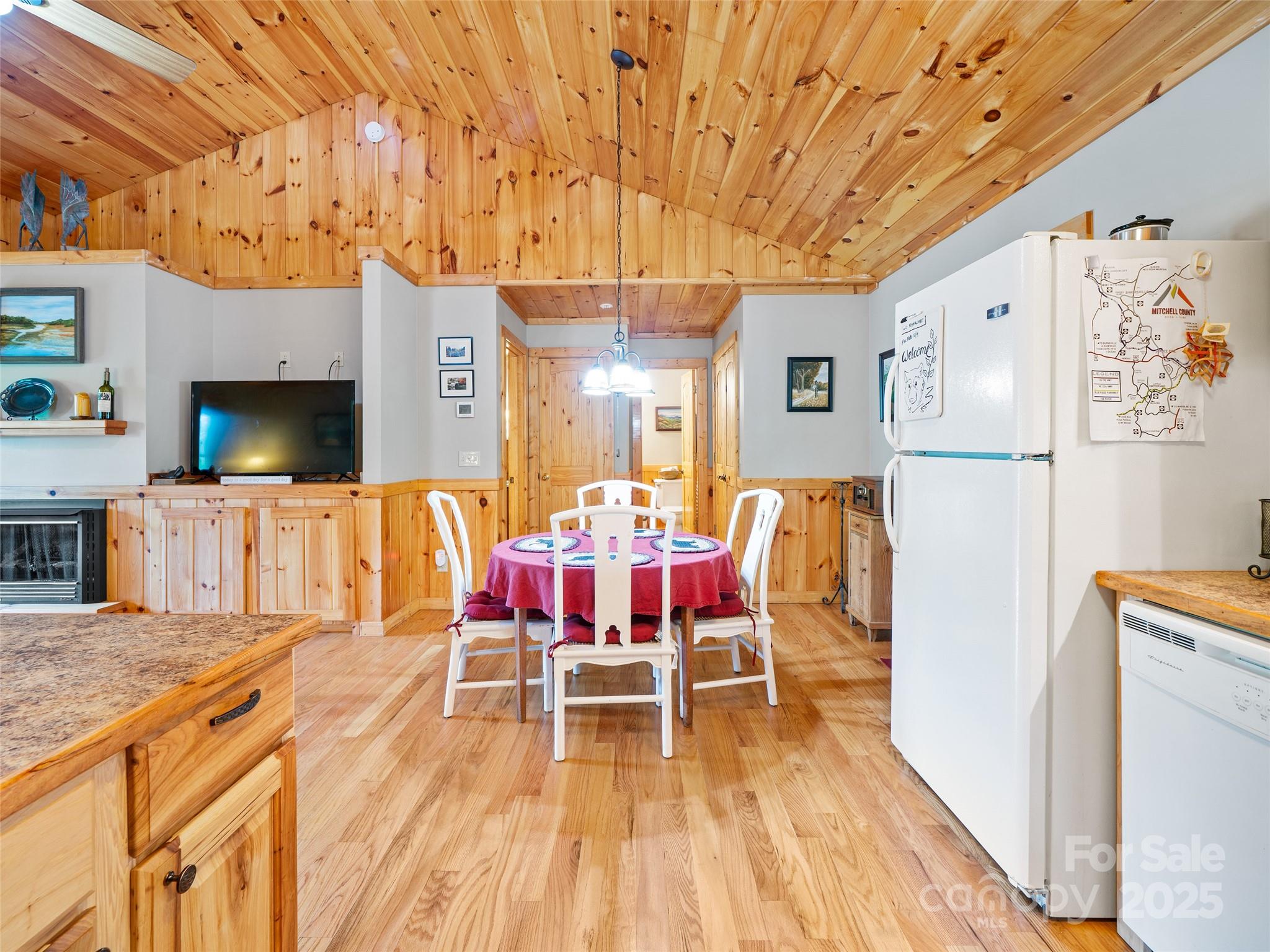 198 Grace Ridge Road Bakersville, NC 28705 - Photo 8 of 27 a dining room with furniture and wooden floor