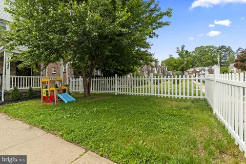 a view of a garden and deck