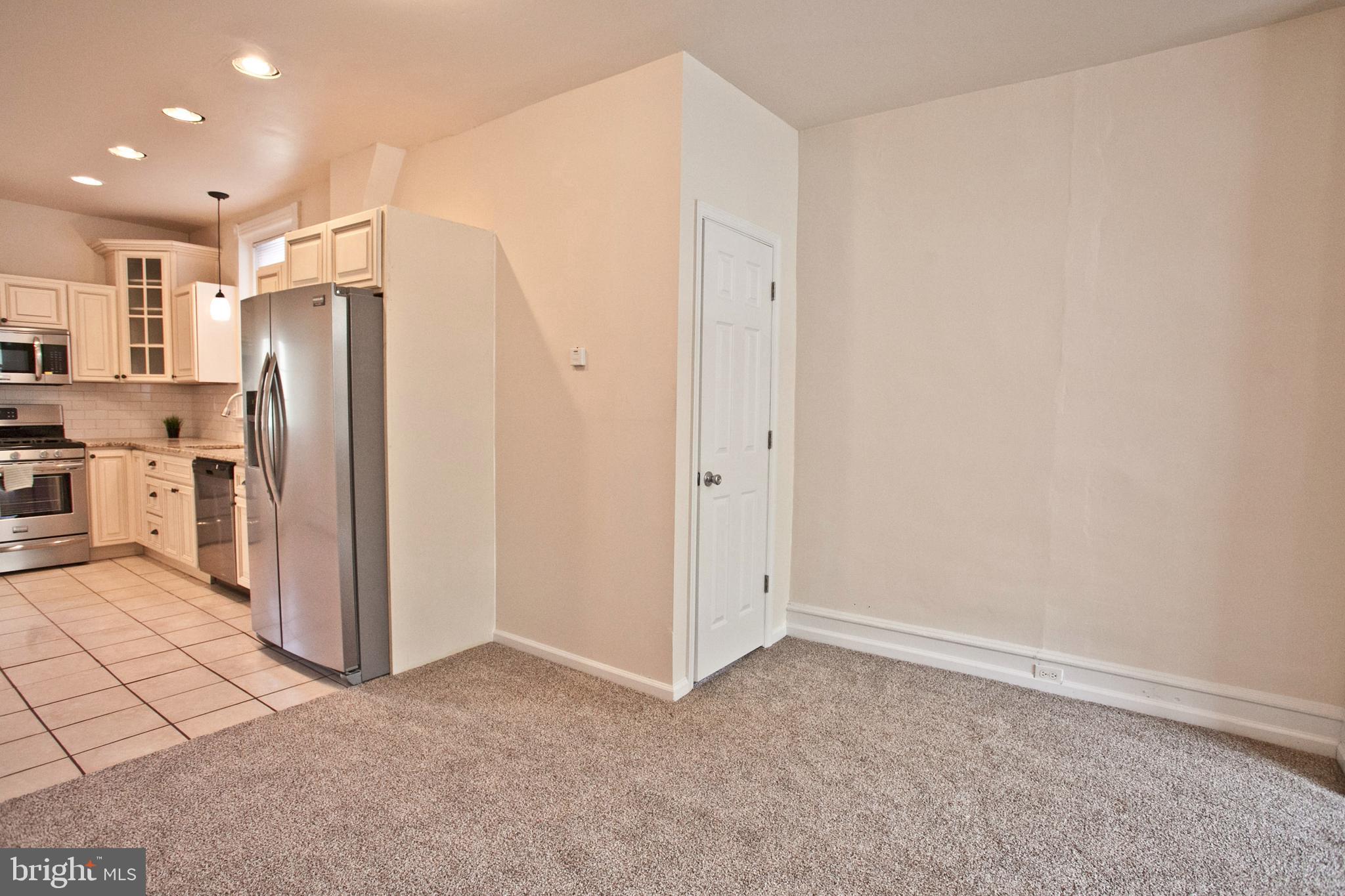 4205 Terrace Street Philadelphia, PA 19128 - Photo 5 of 30 a view of a kitchen with a refrigerator