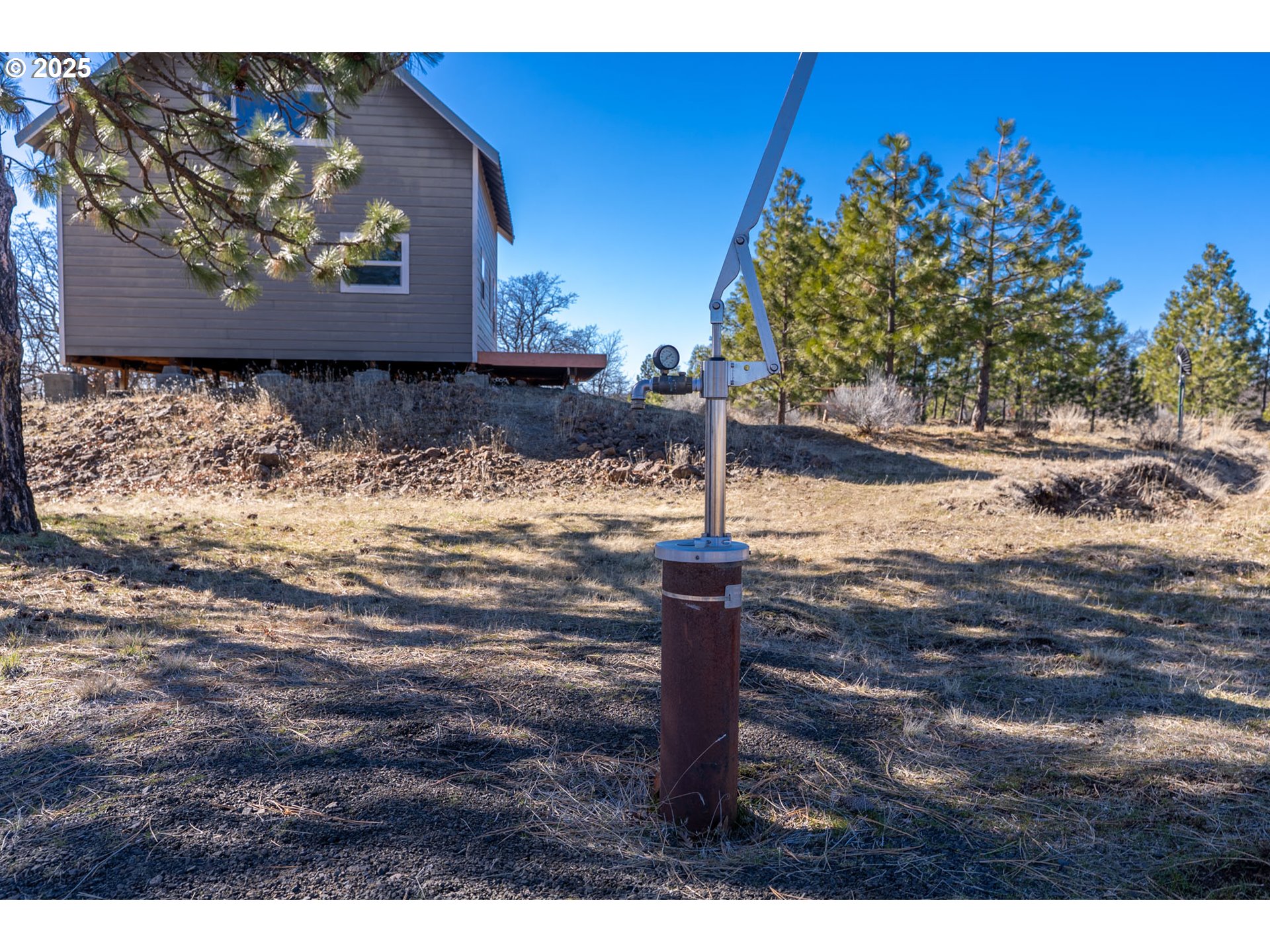 76 Big Springs Road Goldendale, WA 98620 - Photo 20 of 48 a sign that is on the side of the road
