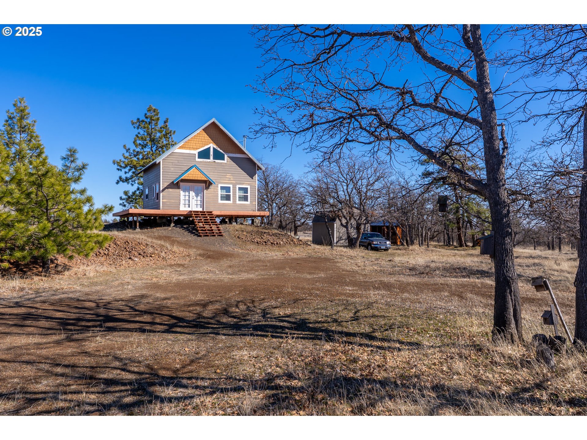 76 Big Springs Road Goldendale, WA 98620 - Photo 2 of 48 a front view of a house with a yard