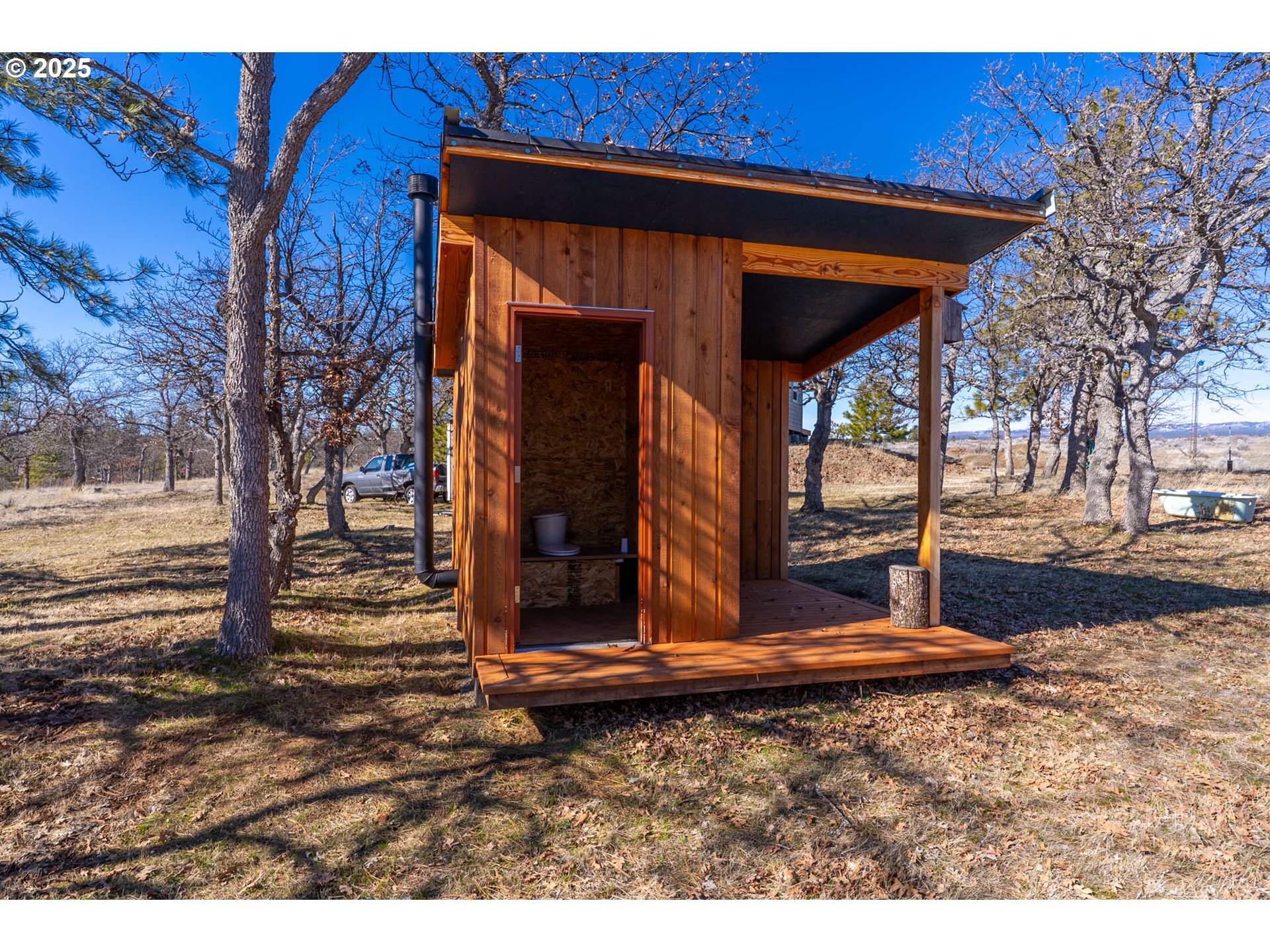 76 Big Springs Road Goldendale, WA 98620 - Photo 21 of 48 a backyard of a house with barbeque oven