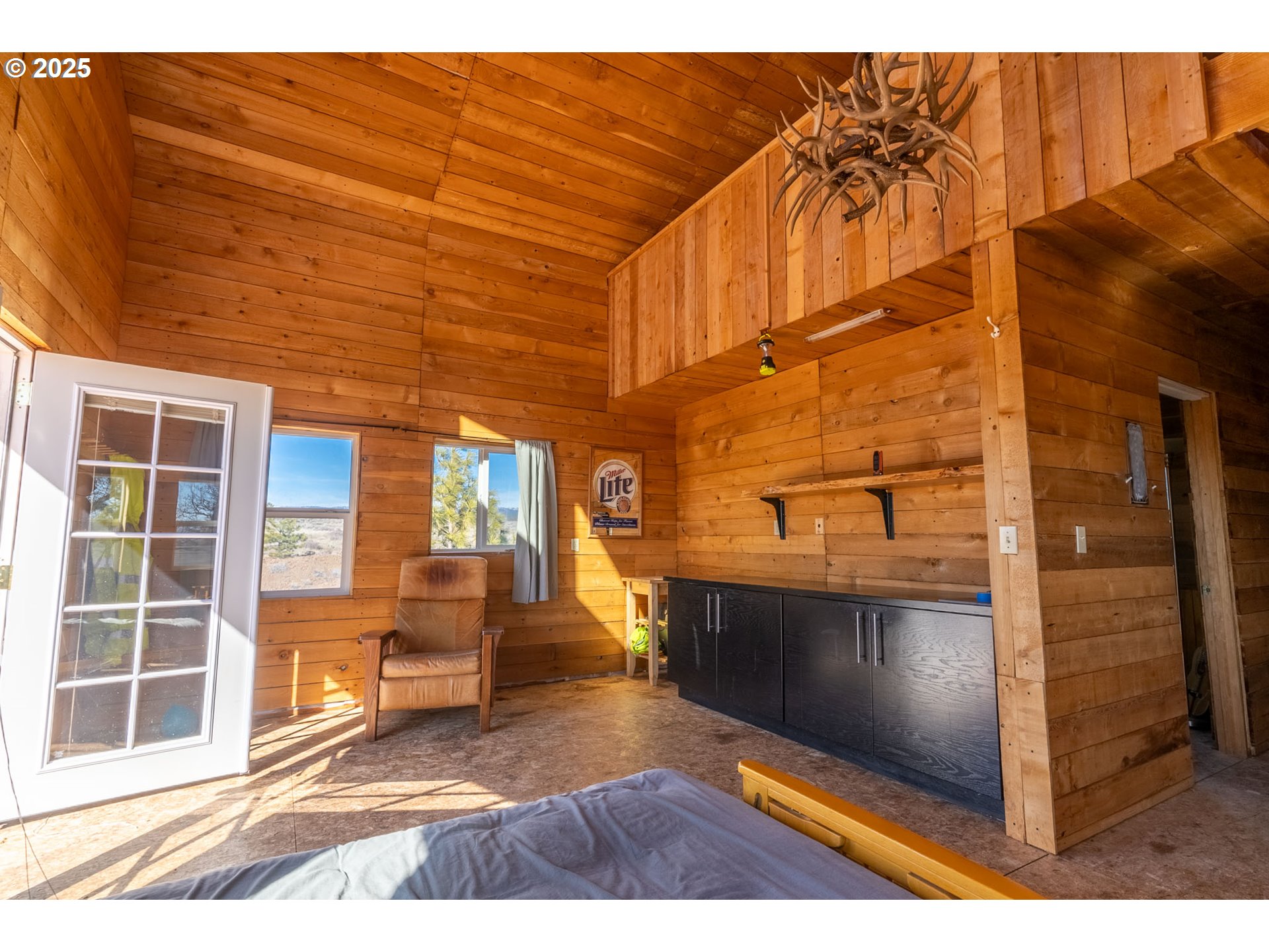 76 Big Springs Road Goldendale, WA 98620 - Photo 5 of 48 a view of a living room with a balcony