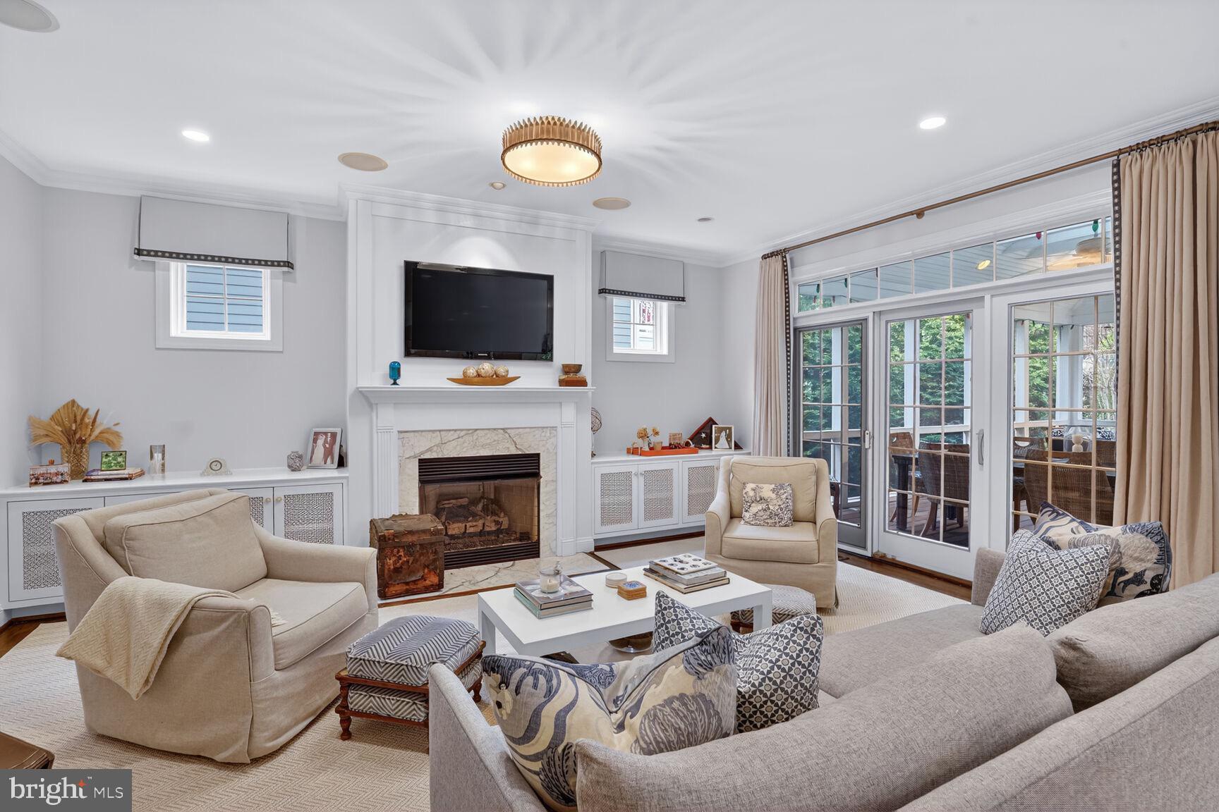 4837 W Street Northwest Washington, DC 20007 - Photo 19 of 59 Sliding doors lead to large screened porch
