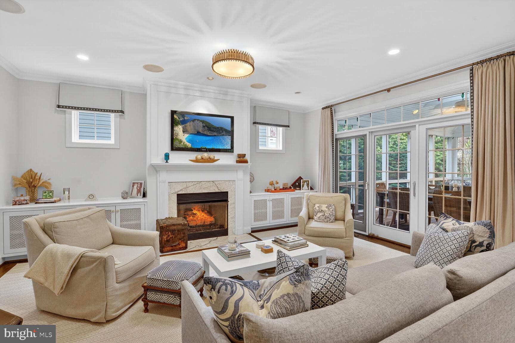 4837 W Street Northwest Washington, DC 20007 - Photo 22 of 59 Sliding doors lead to large screened porch