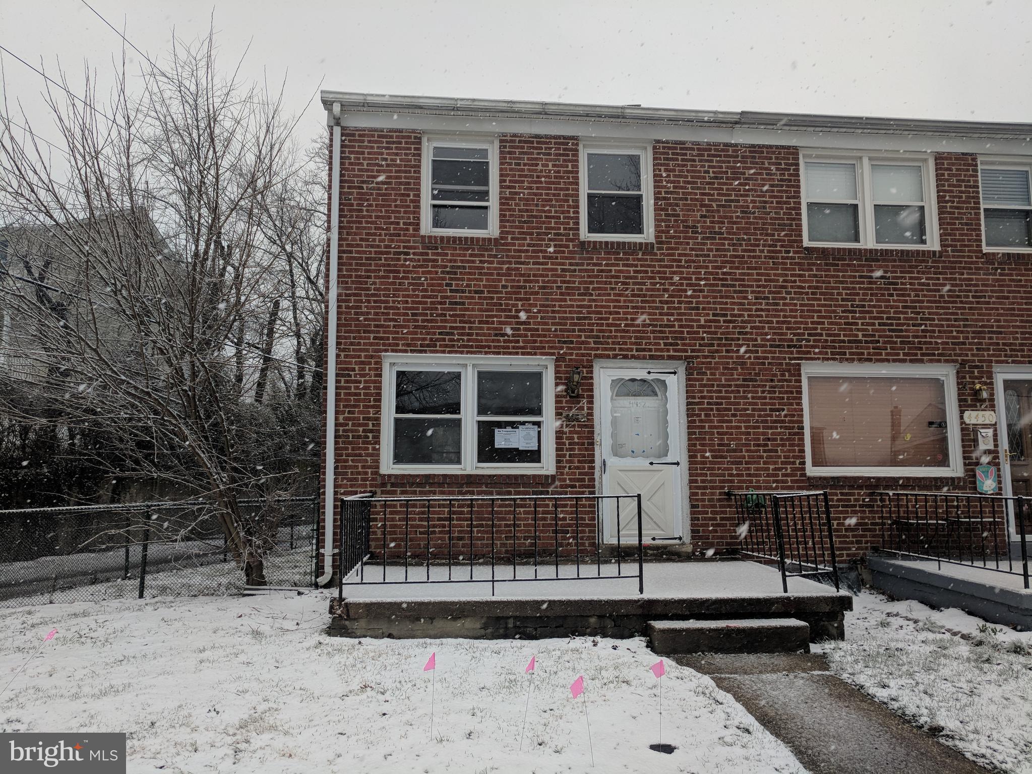4452 Scotia Road Baltimore, MD 21227 - Photo 1 of 20 a front view of a house with a yard