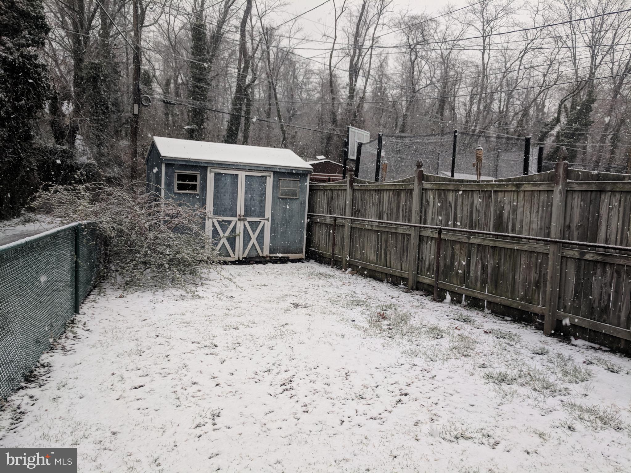 4452 Scotia Road Baltimore, MD 21227 - Photo 2 of 20 a view of a house with wooden fence