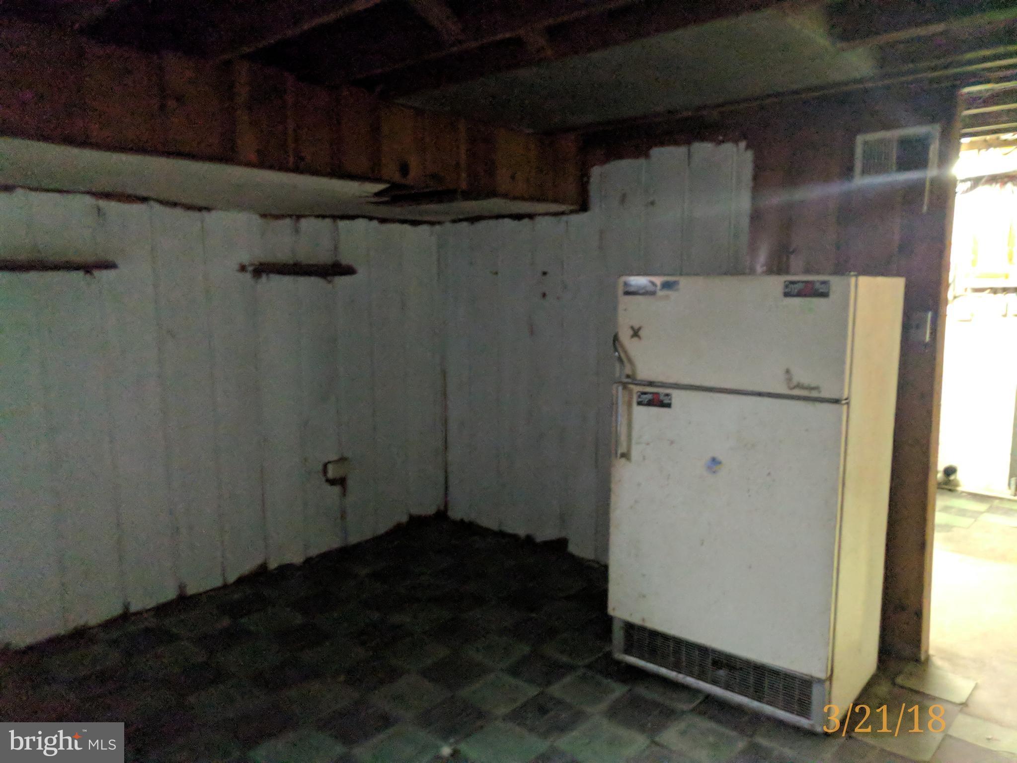 4452 Scotia Road Baltimore, MD 21227 - Photo 12 of 20 a view of water heater room