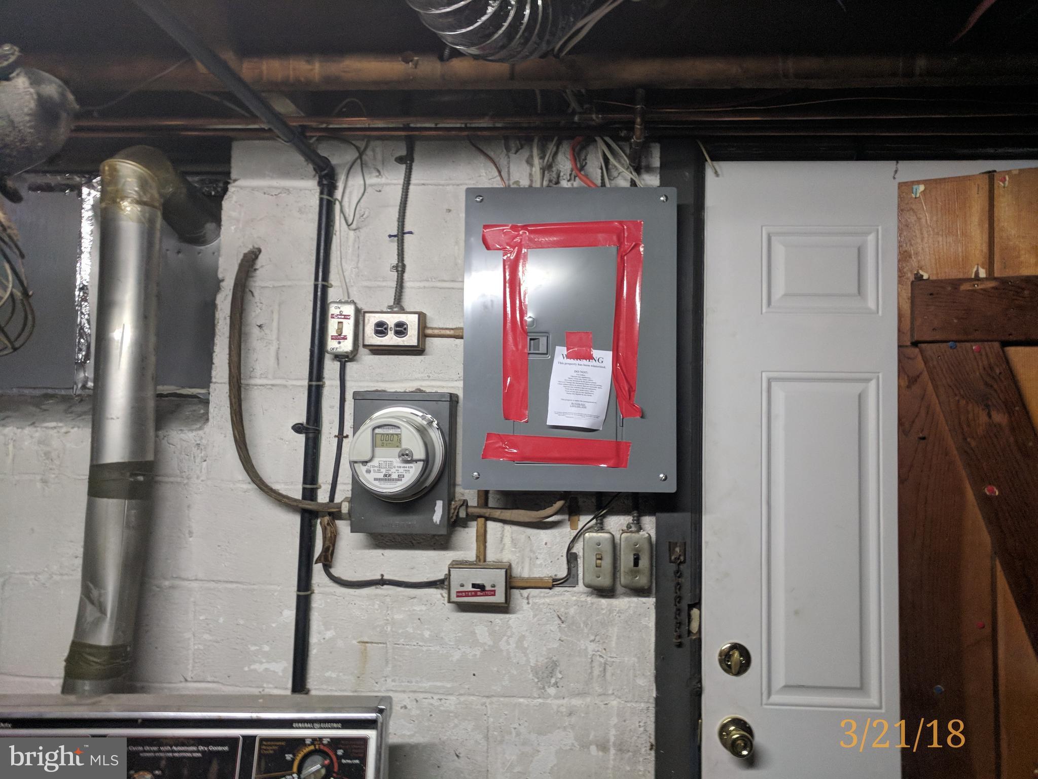4452 Scotia Road Baltimore, MD 21227 - Photo 13 of 20 a close view of door lock