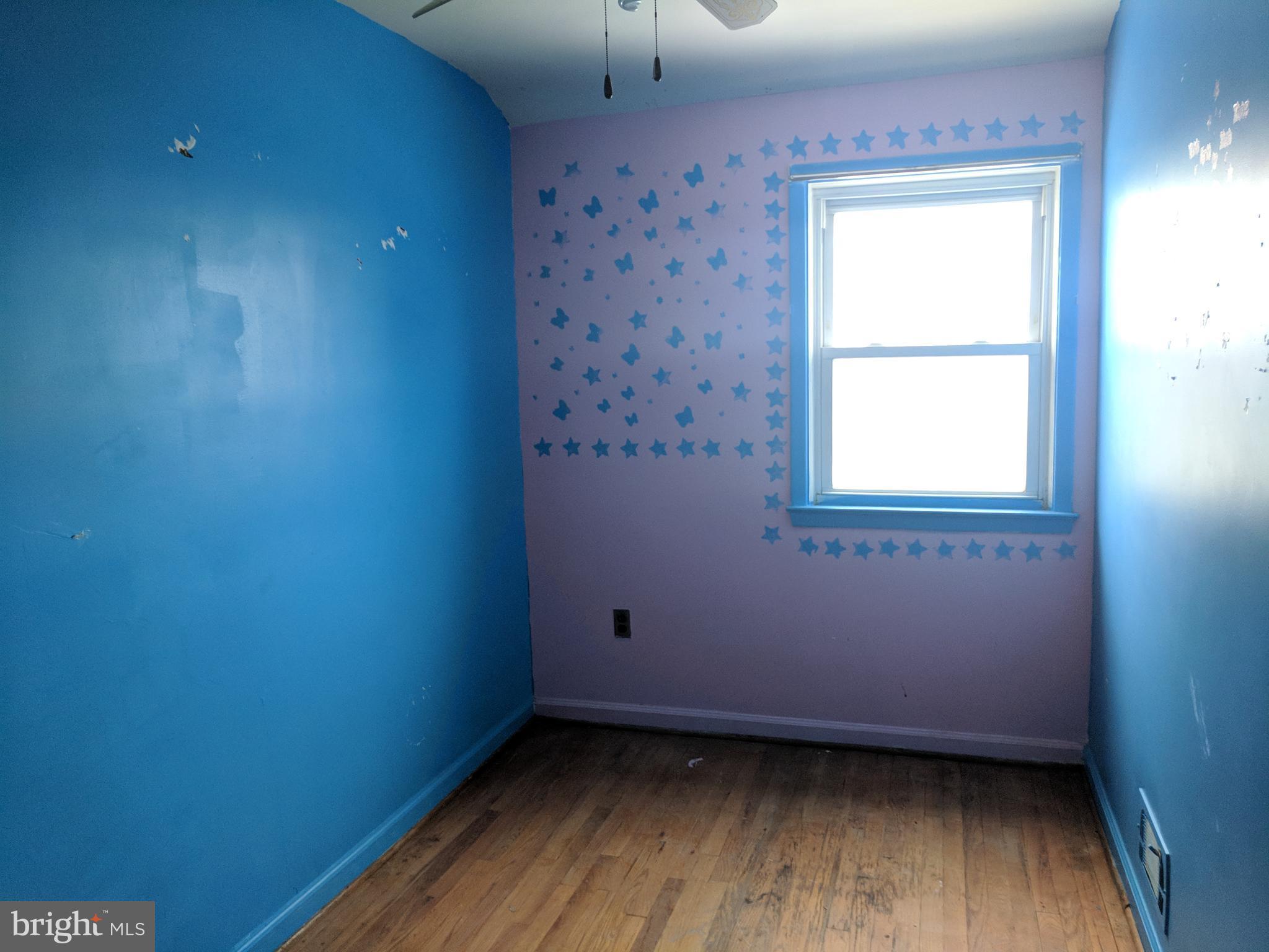 4452 Scotia Road Baltimore, MD 21227 - Photo 17 of 20 an empty room with a window