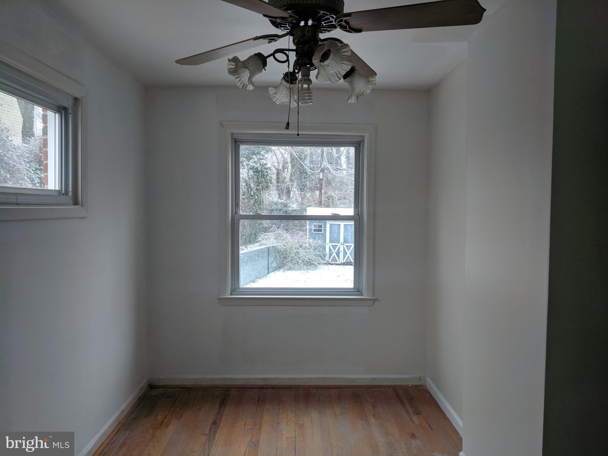 4452 Scotia Road Baltimore, MD 21227 - Photo 7 of 20 an empty room with a window