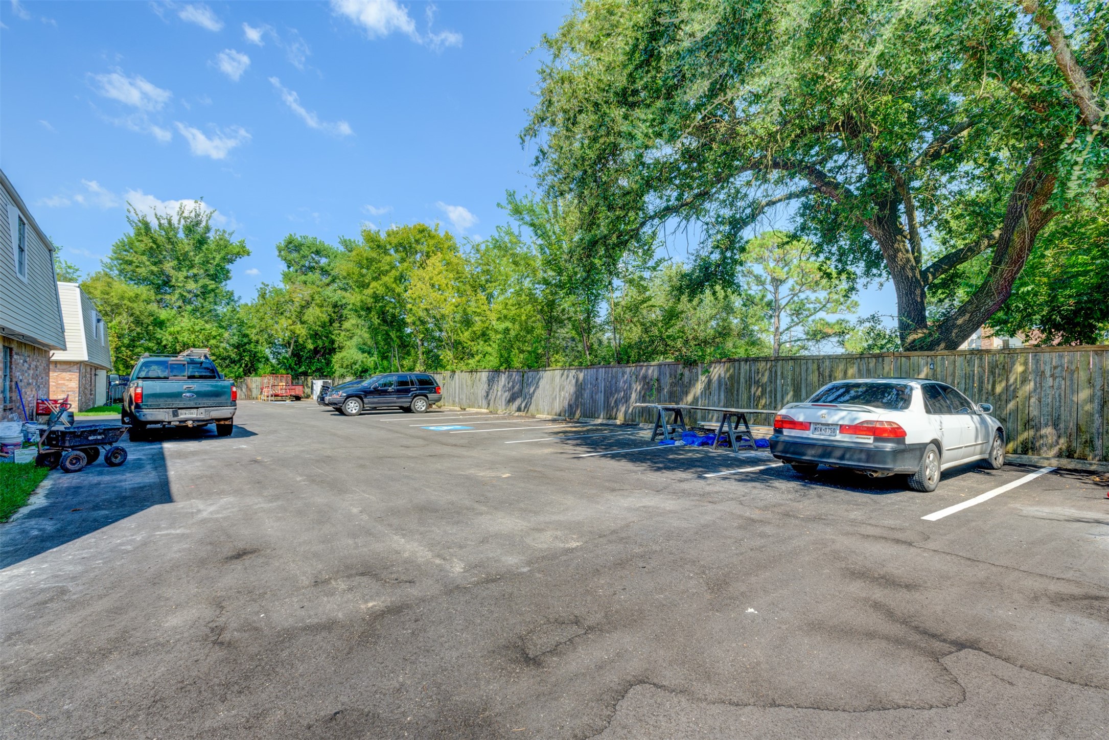523 Spring Drive, Unit 4 Pasadena, TX 77504 - Photo 17 of 18 Large parking lot in Back